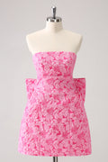 Robe courte trapèze fuchsia fleurie en brocart pour bal de rentrée, bustier et grand nœud au dos