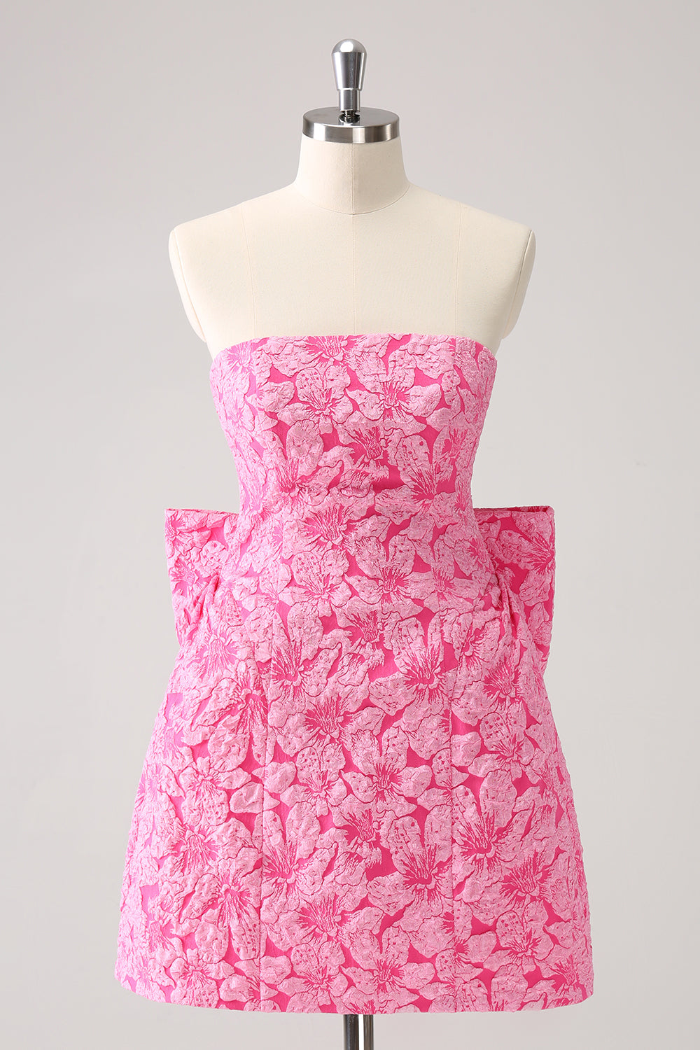 Robe courte trapèze fuchsia fleurie en brocart pour bal de rentrée, bustier et grand nœud au dos