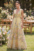 Robe longue trapèze jaune en tulle, col V et broderies florales